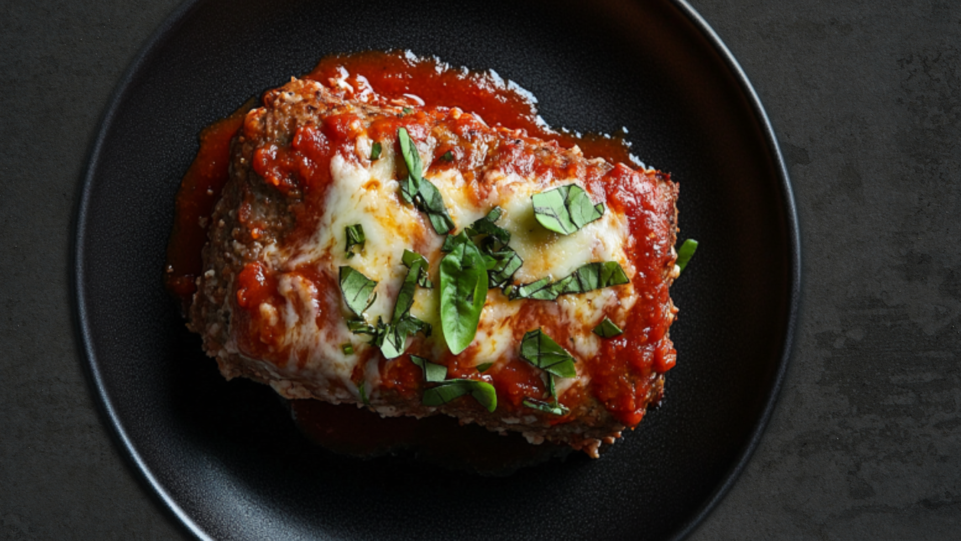 Photo of Italian-style meatloaf with Tomato Cream Sauce and Mozzarella